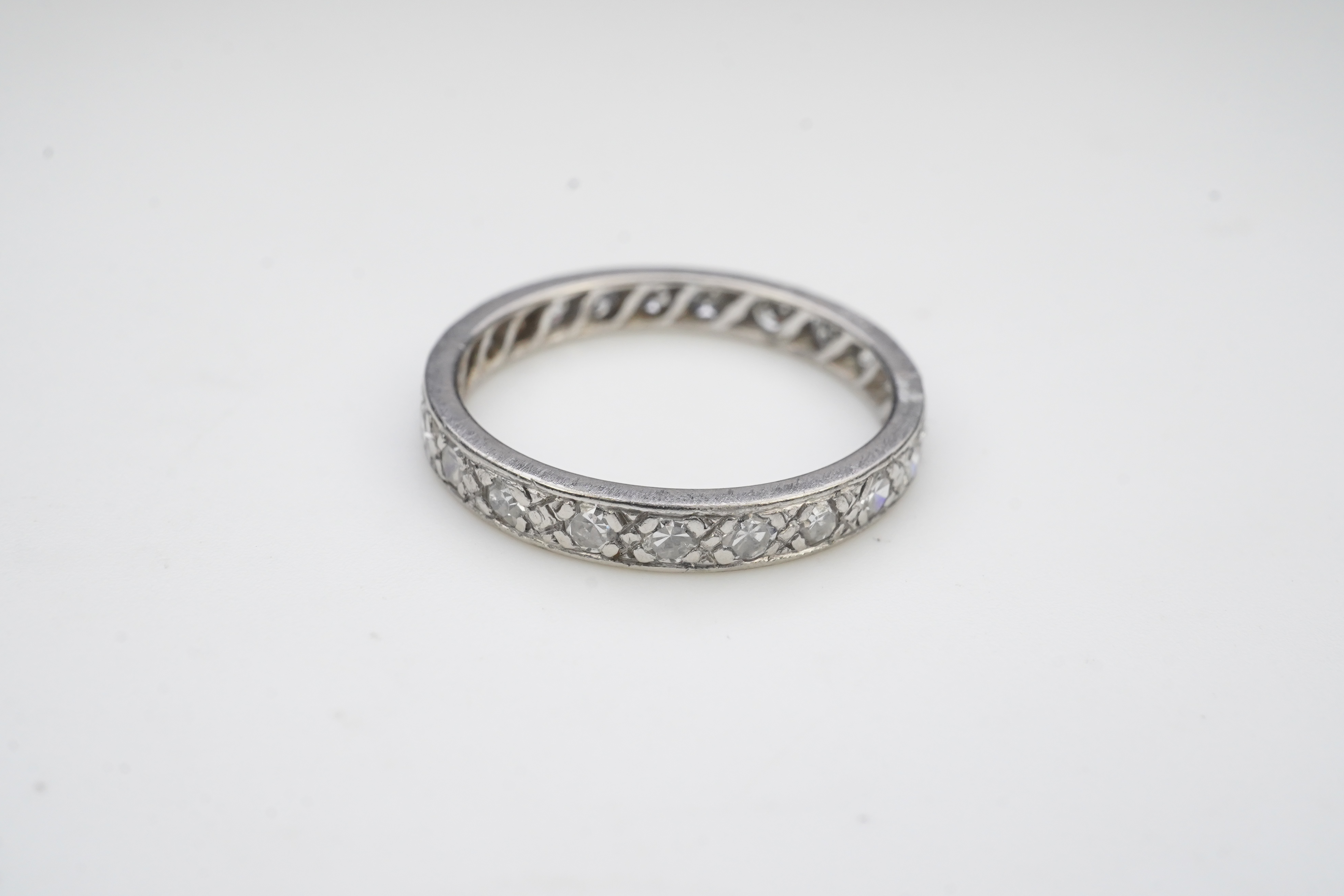 A diamond eternity ring, mid 20th century